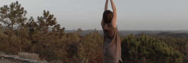 video of a woman practicing yoga on a mountain top